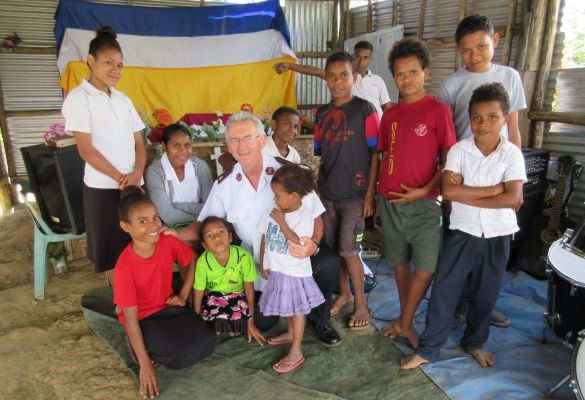 Colonel Alley fulfils promise to visit remote PNG village