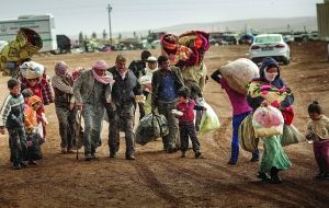 A "big hello" welcomes Syrian refugees to Australia