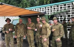 'Sallyman' soldiering on in flood-hit Townsville